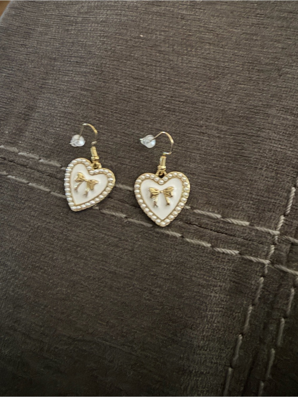 Gold and White Heart Drop Earrings with Bow Accent